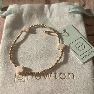 E Newton off white cross pattern bracelet